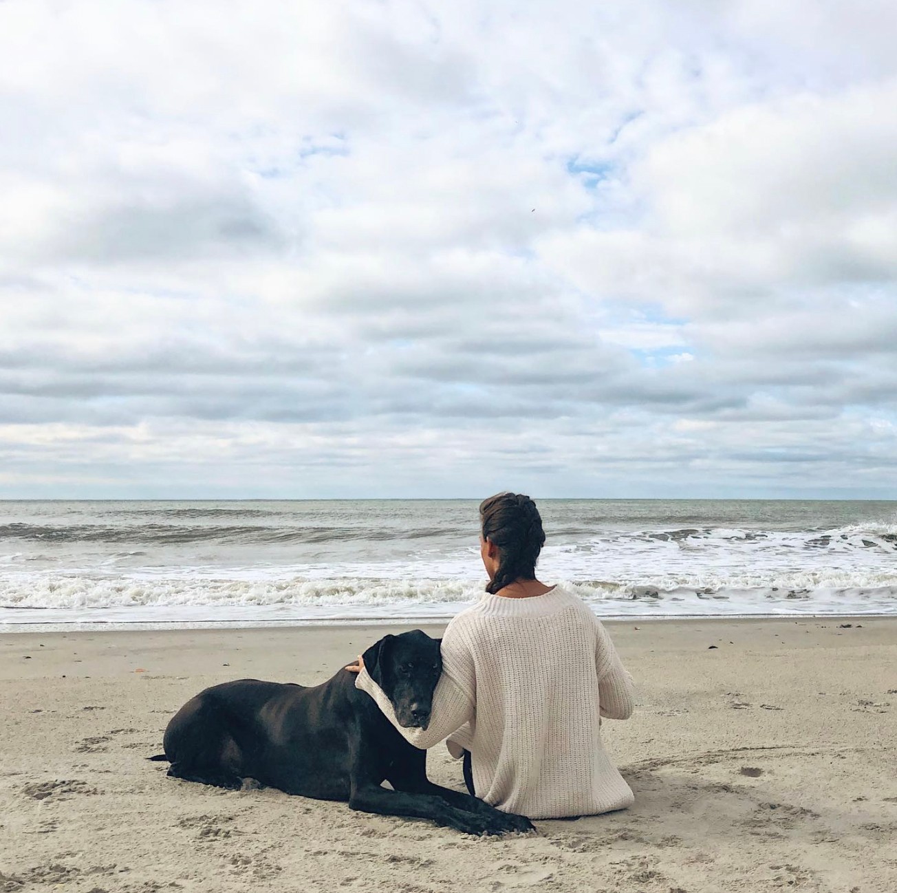 Maddox the Great Dane and Jennifer on the beach at Emerald Isle